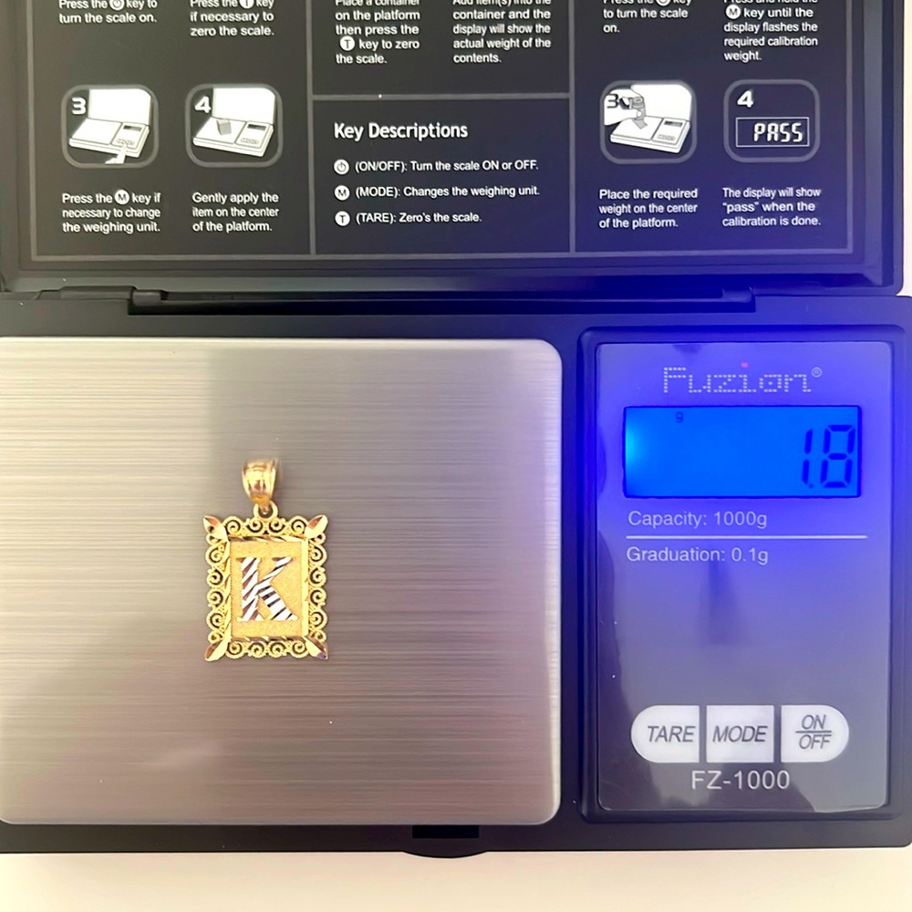 10 k yellow gold K pendant